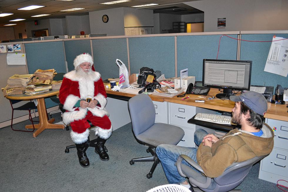 Jon sits down with Santa for a hard-hitting interview at the Insider pod. (TIM GOODWIN / Insider staff) -