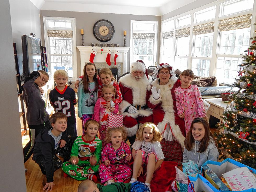 Santa and Mrs. Claus visit a birthday party in Bow. All of the children were on the Nice List, Santa said. (Courtesy) -