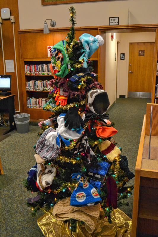 The Keep Concord Warm Tree at the Concord Public Library. (TIM GOODWIN / Insider staff) - 
