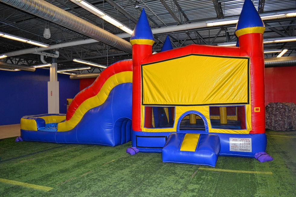 Here's one of the half-dozen or so bouncy structures at Bounce House Entertainment Center at the Steeplegate Mall. They're constantly adding stuff to the place, so it's hard to keep track of how many pieces of equipment are in there at any given moment. (TIM GOODWIN / Insider staff) - 
