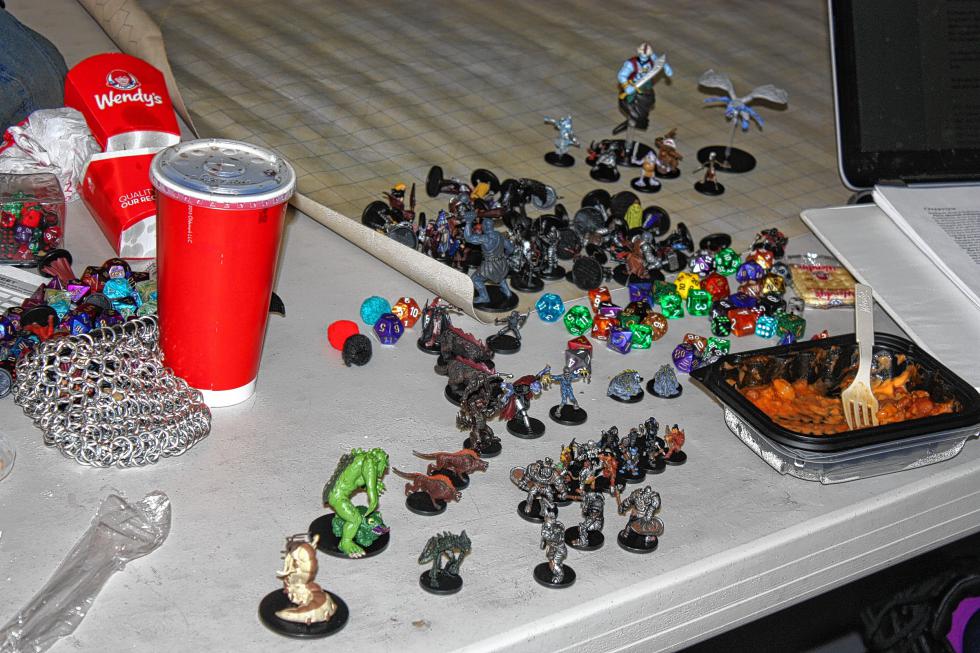 The necessary pieces for Dungeons & Dragons, with some fast food on the side. (JON BODELL / Insider staff) - 