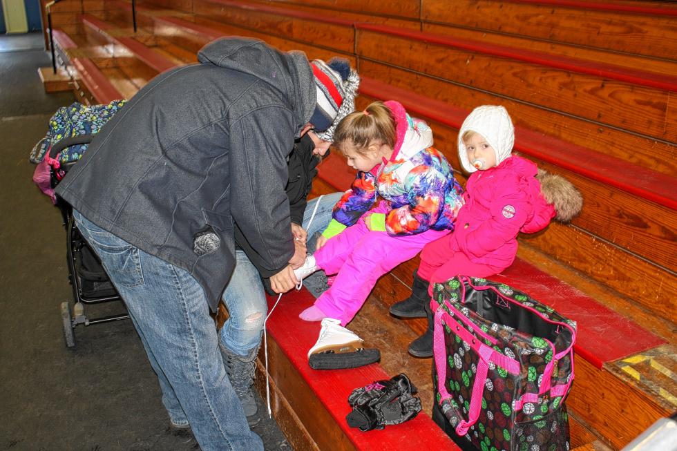 Corah (right), 1½, is a little young for the skates right now, but that didn't stop her from coming out to Everett Arena to watch her sister, Kayda, give it a shot. We're sure Kayda probably appreciated the moral support. (JON BODELL / Insider staff) -