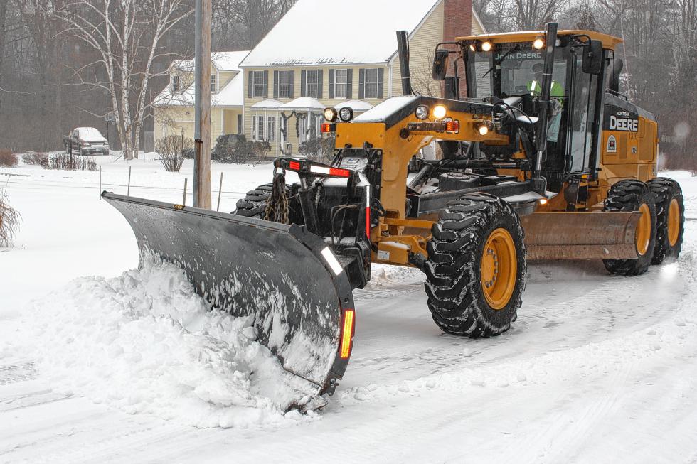The city's road grader clears massive amounts of snow in one fell swoop. (JON BODELL / Insider staff) -