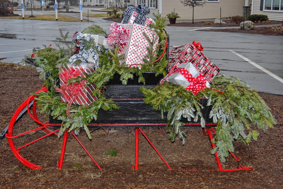 7. We weren’t sure if the famous wrestler clue would throw people off, but the retirement community piece made it a little more obvious. Anyways, this sleigh filled with presents was outside Havenwood Heritage Heights, in front of Tad’s Place, off East Side Drive. - 
