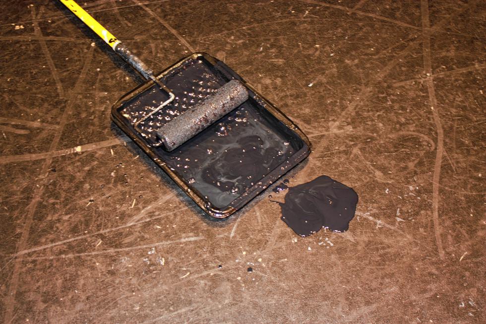 Here's one of those occasions where it's totally fine to spill a huge blob of black paint all over the floor. In fact, the whole point of the day was to make the floor as black as possible, so nice work. (JON BODELL / Insider staff) -