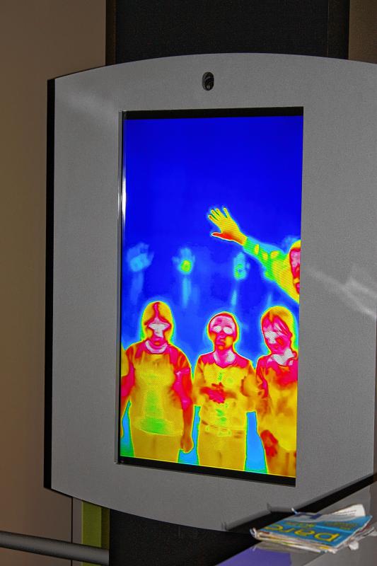 Kids from Chichester Central School look at themselves in infrared form at an exhibit all about the light spectrum. Behind them are handprints – if you put your hand on the wall, the infrared camera still sees the heat long after you take it away. Pretty cool. (JON BODELL / Insider staff) -