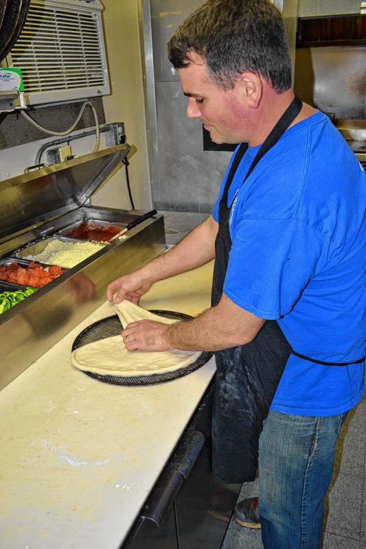 Dave Constant forms the dough into the shape of a heart. (TIM GOODWIN / Insider staff) -