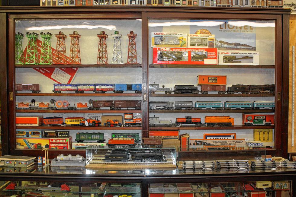 Some of the older trains at Depot Antiques & Toys are kept in a glass case. (JON BODELL / Insider staff) -