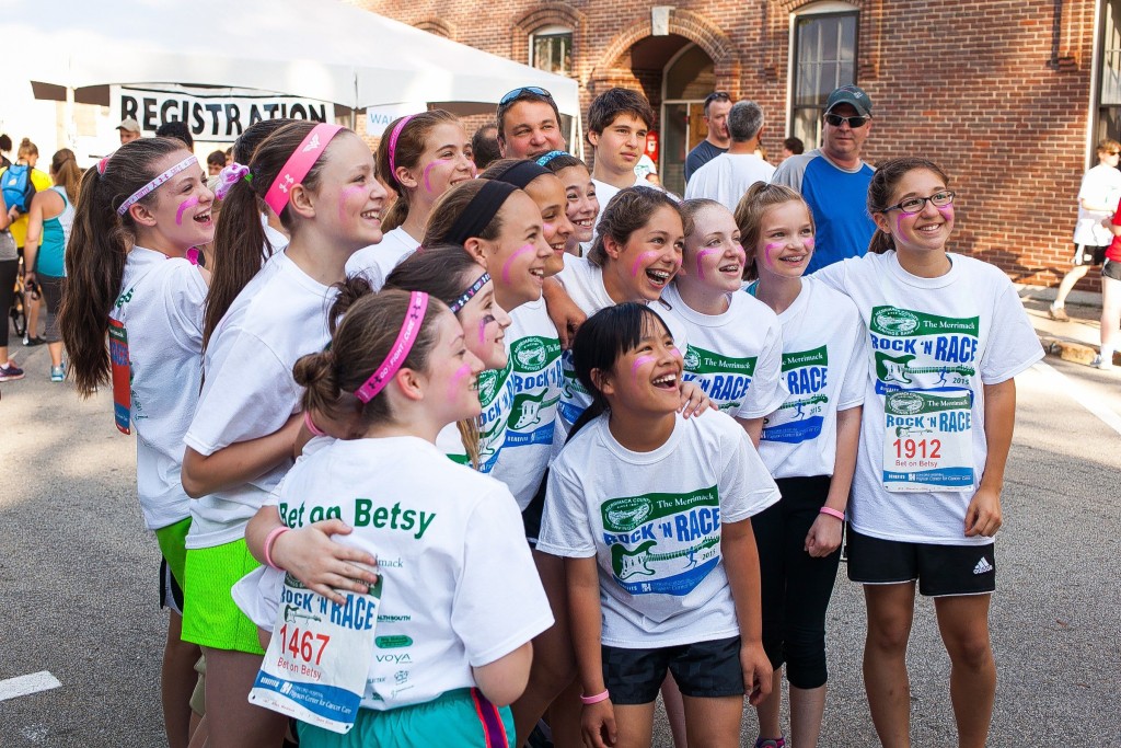 ELIZABETH FRANTZThe younger half of the Bet on Betsy team pauses for a photo before reaching the starting line of the annual Rock ‘N Race 5K in downtown Concord on Thursday