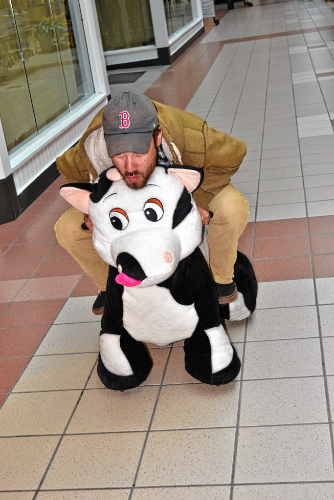 riding stuffed animals in mall