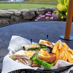 Food Snob: Eating a sandwich while watching some golf