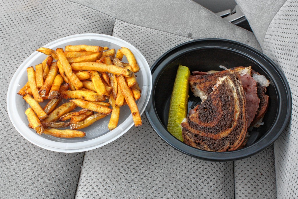 THE FOOD SNOB / Insider staffA Reuben and a side of hand-cut fries from Zac’s Snax. Don’t mind the table, which happens to  look an awful lot like the passenger seat of a car.