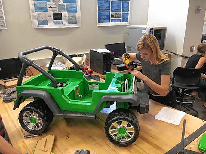 Tim Goodwin—Insider staffStudents in the St. Paul's School Advanced Studies Program helped equip toy ride on cars for children with mobility issues through GoBabyGo New Hampshire.