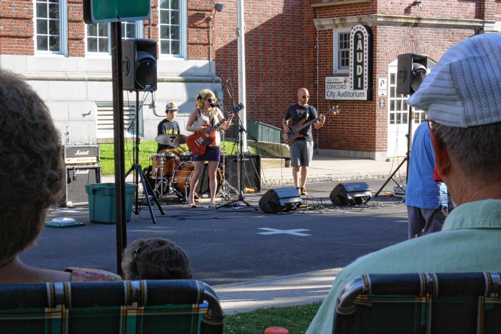 JON BODELL / Insider staff—People Skills performs on Prince Street during the summer's first installment of Live Music on the Lawn, put on by the Concord Public Library.