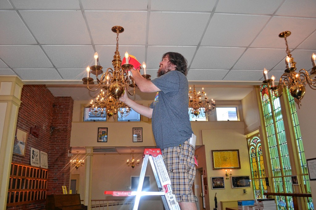 Tim Goodwin—Insider staffTim decided to do his part, so he volunteered at the Friends of the Audi's 26th annual Pitch In and dusted some chandeliers.