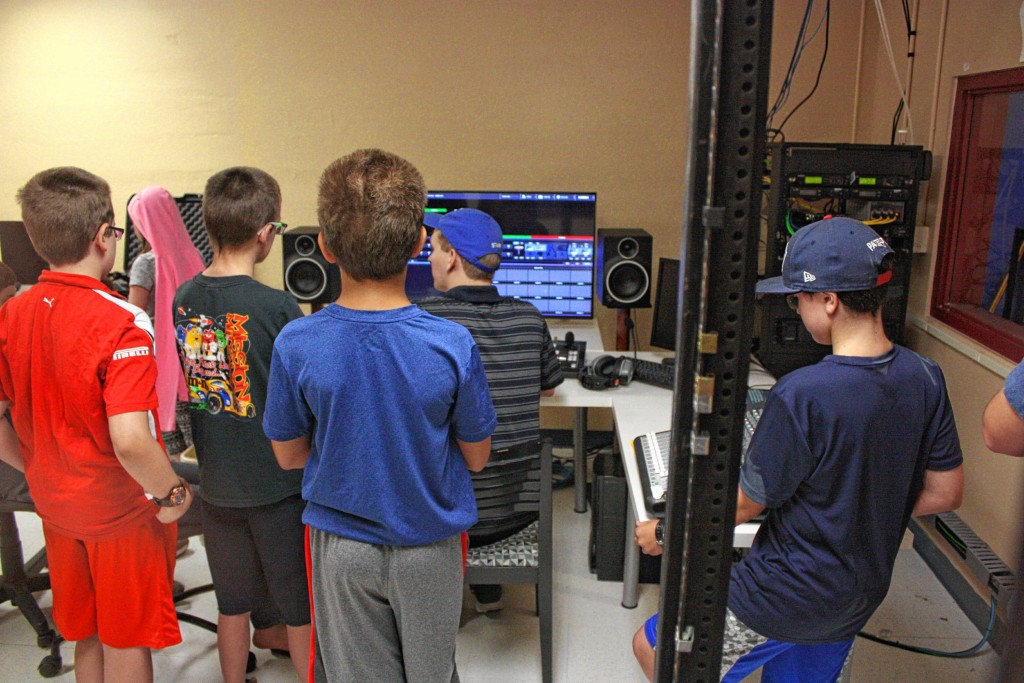 JON BODELL / Insider staffParticipants in ConcordTV’s Advanced Video Camp gather around the editing station to learn some pointers from Josh Hardy. Their skills will be on display at Red River Theatres on Aug. 24.
