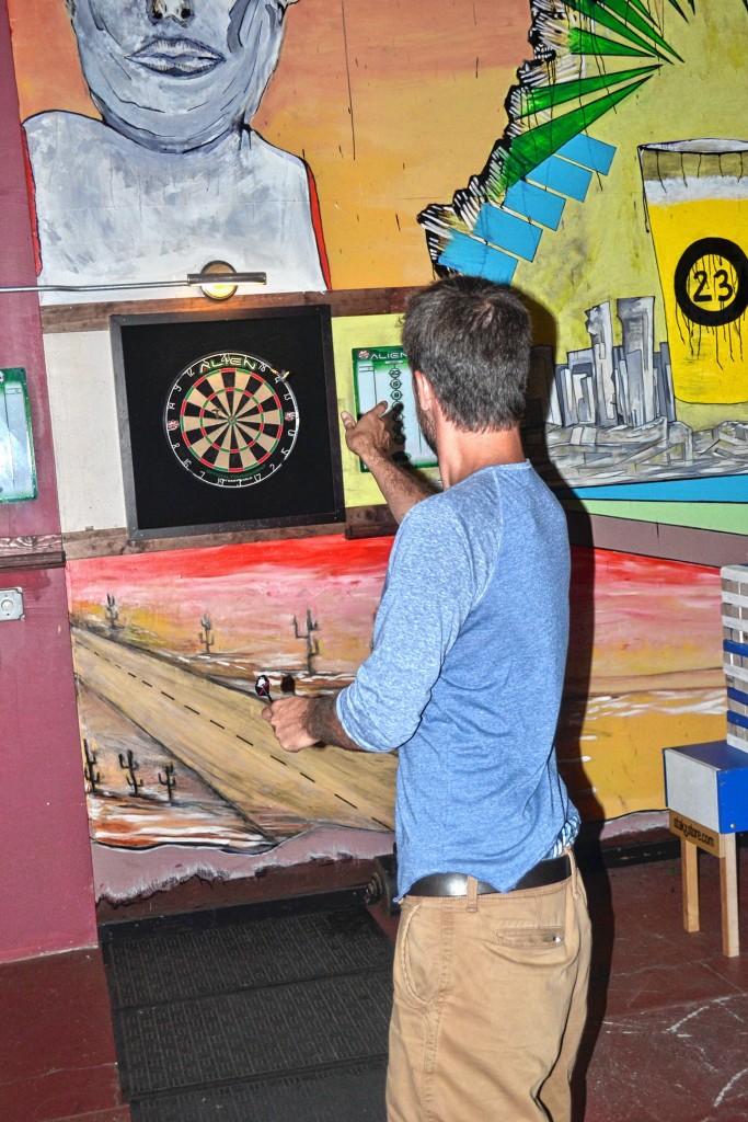 TIM GOODWIN / Insider staffJon fires a shot during a darts tourney at Area 23 last Thursday.