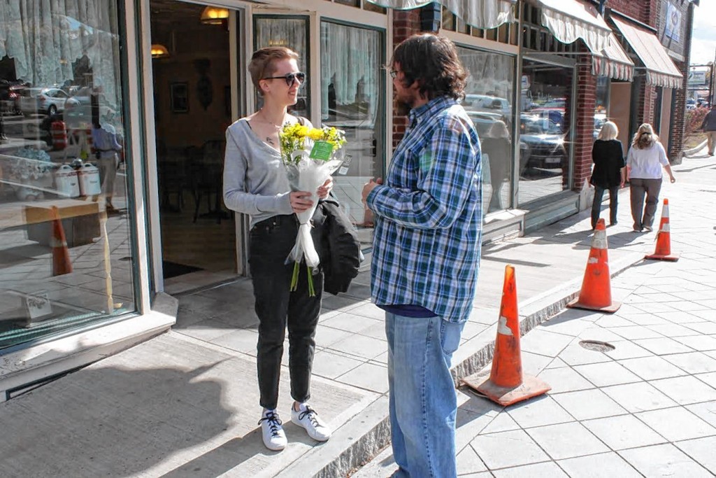 Jon Bodell—Insider staffTim took to South Main Street last week to hand out flowers for Cole Gardens as part of the Petal It Forward program.