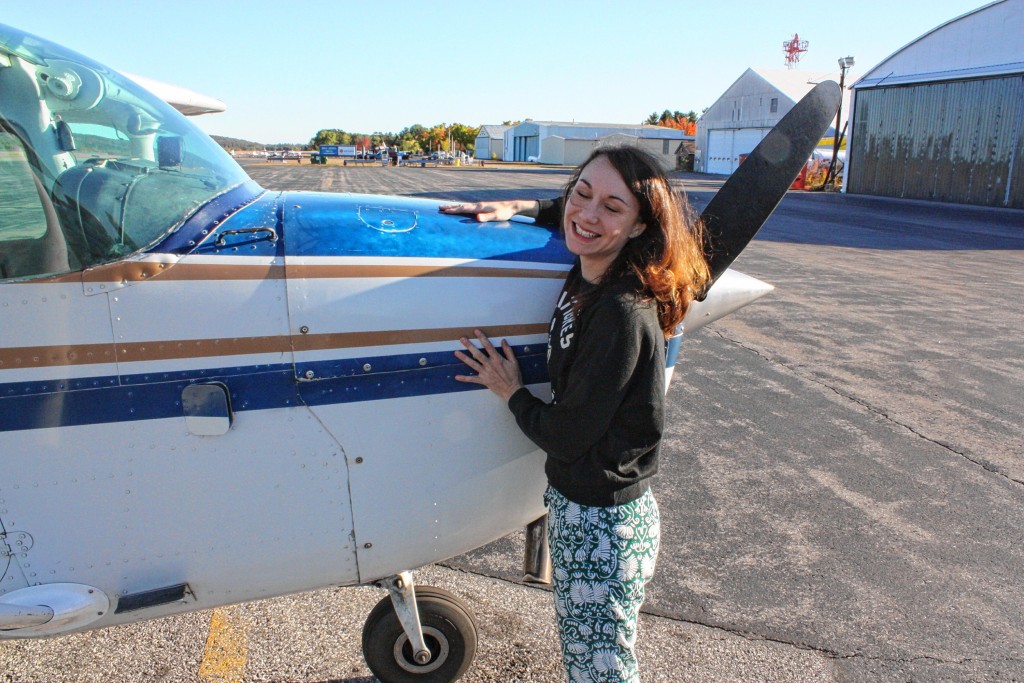 JON BODELL / Insider staff—Pre-flight Step 6: Though not explicitly required, pilot Carole Gadois likes to give the plane a nice hug before hopping inside. Seems like a good idea to us.