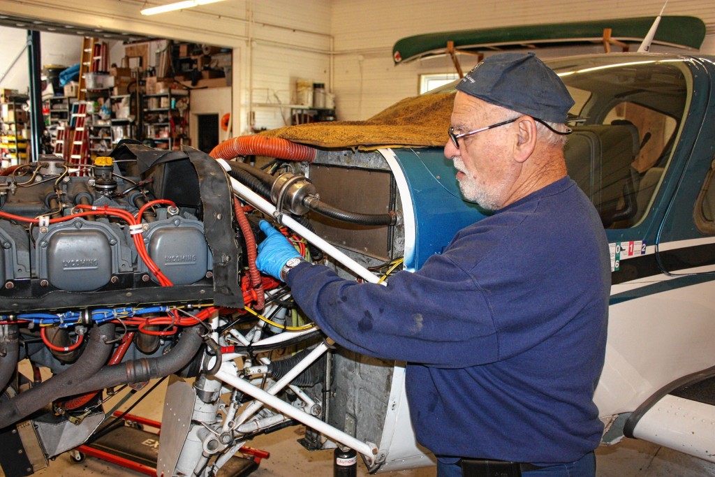 JON BODELL / Insider staffConcord Aviation Services airplane mechanic Dick Meyers goes over some of the details of inspecting and working on an airplane at Concord Regional Airport last week. Meyers has been working on planes since 1961, including the last 17 years at the Concord Airport.