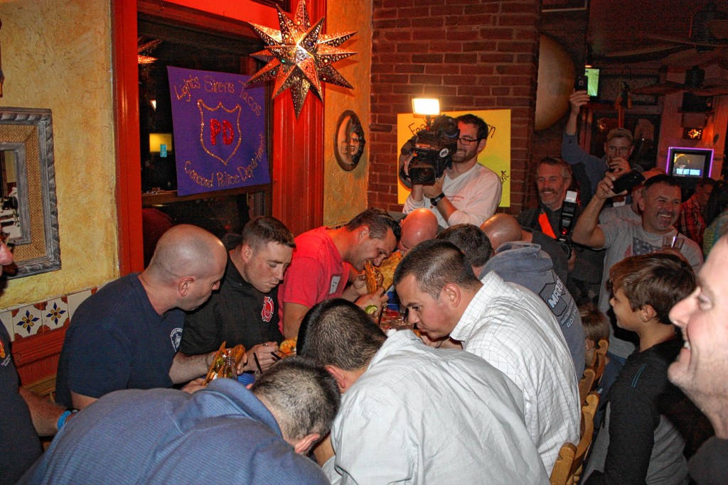 JON BODELL / Insider staff—It was an absolute madhouse at Margarita's last week for the Battle of the Badges Taco Gigante Challenge, in which Concord's finest police officers and firefighters squared off to see who could devour their 2-pound tacos the fastest.  (Hint: the winners can often be seen driving huge red trucks.)