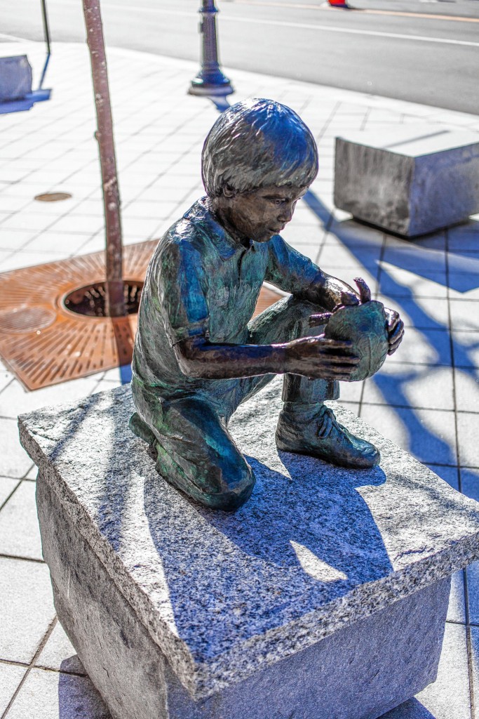 This bronze boy holding a turtle, created by Beverly Benson Seamans, is one of the newer additions to South Main Street.