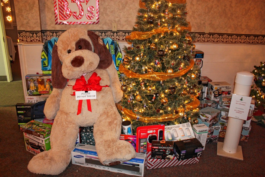 This tree, provided by BJ's Wholesale Club, is one of the most popular and coveted trees, evidenced by the jumbo tube to hold many, many raffle tickets. This bad boy comes with, among about a million other things, a gigantic stuffed dog (which will likely require serious logistical planning to transport), a Samsung sound bar, kitchen supplies, a lava lamp, an Atari system (a modern one, not some relic from the early '90s), a drone and a mobile charging station.
