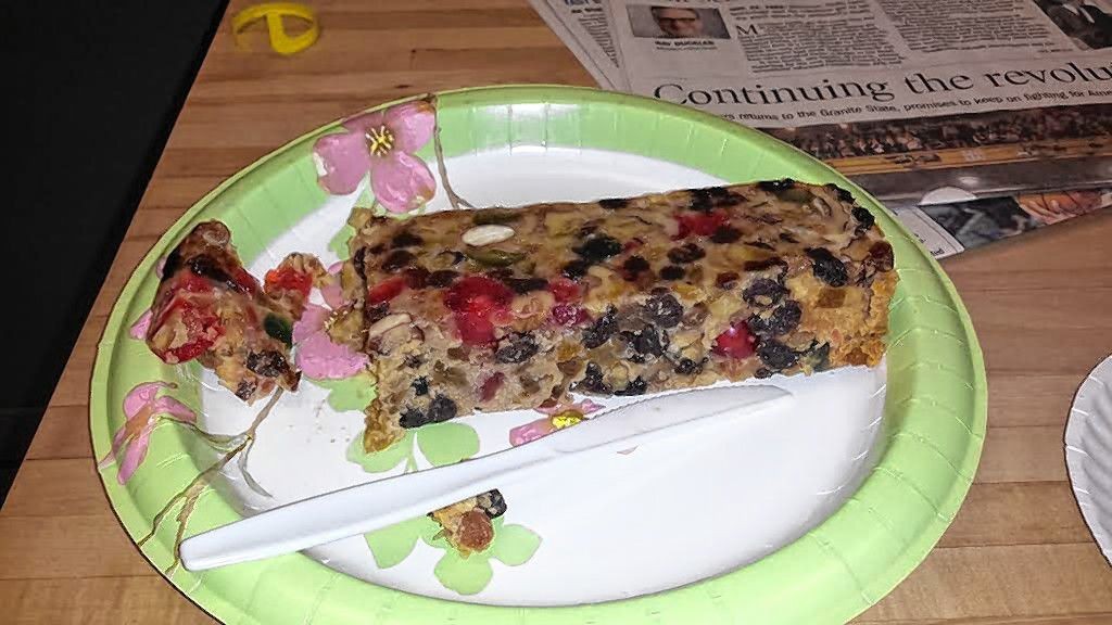 Here's proof that we bought and ate (at least some of) a classic, store bought fruit cake.