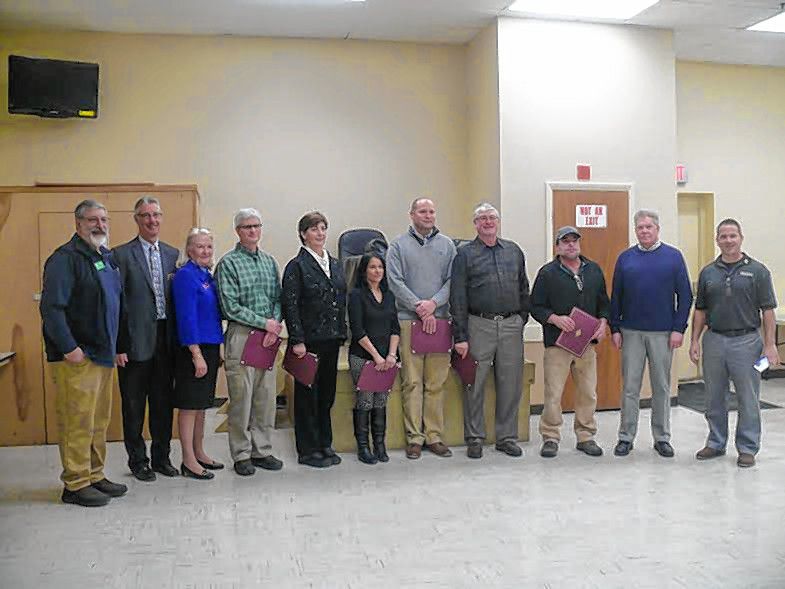 NHTI, along with 50 members of the New Hampshire Building Officials Association, honored the first six graduates of the school’s Building Inspector and Plans Examiner Certificate Program on Jan. 11 at the International Brotherhood of Electrical Workers Hall on Airport Road. Launched in fall 2015, the three-semester, 18-credit-hour program prepares students to critically examine permit applications and plans for residential, commercial and other building types, and to subsequently ensure that the construction of buildings with permits is conducted in accordance with and within the provisions of relevant building codes.  For more information, visit nhti.edu/academics/programs-study/engineering-technology-programs/building-inspector-and-plans-examiner, or contact admissions at 230-4011 or nhtiadm@ccsnh.edu. From left: Tedd Evans, chief building inspector, city of Concord and NHTI instructor; Steve Caccia, NHTI V.P. of student affairs; Dr. Susan Denton, NHTI president; graduates Bill Booth, Norma Ditri, Dawn Michaud, Corey Rider, Mike Cummings and Steve Martin; Bill McKinney, V.P., N.H. Building Officials Association; and Bill Nash, International Code Council representative.