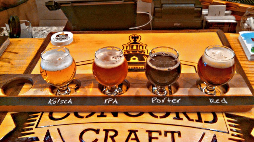 A full flight of Concord Craft Brewing Co.’s offerings: kolsch, IPA, porter and red.