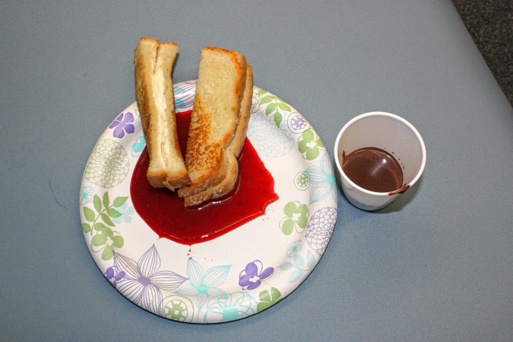 You can't have a Valentine's Day meal without dessert. Here's the Grilled Sweet Cheese Sandwich with Rosemary Chocolate Soup (yes, a soup made of chocolate and rosemary) and Raspberry Puree. This little concoction tasted exactly like high-end cheesecake drizzled with raspberry sauce, and it was so easy to make. (JON BODELL / Insider staff)
