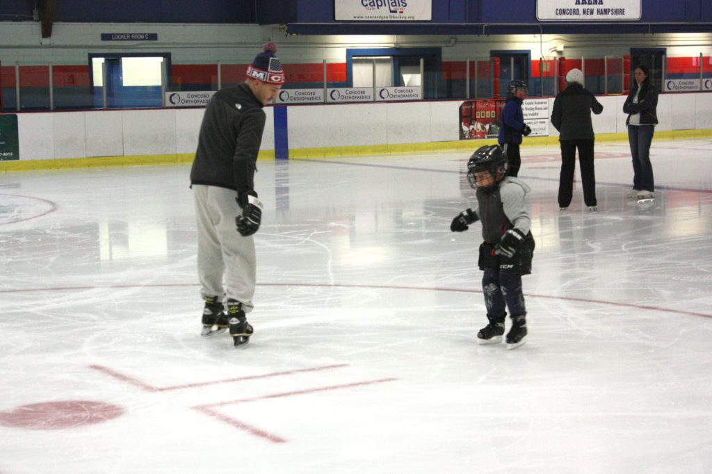 Carter Locke (right), 5, gets an ice skating lesson from his dad, Nate, at Everett Arena last week. There were a few slips and falls along the way, but that didn't stop these boys from having an ice time (see what we did there?).