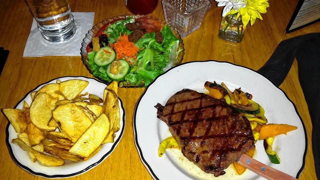 What we quickly found out is that Henniker is home to some great spots to grab a bite. But unfortunately there’s only so many times you can eat in one day, so you’ll just have to go check out some of them for us and report back. Top: A N.Y. Sirloin from Daniel’s Restaurant & Pub. Above: Now that’s what we call a slice – from Western Ave. Pizzeria.