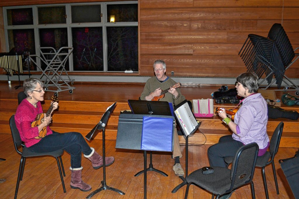 Susanne Kibler-Hacker, left, and Bill and Debbie Potter put out a great rendition of the Beatles’ “Obladi Oblada” on the ukuleles last Friday at St. Paul’s School.