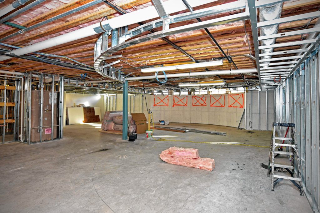 Here's what the basement space looked like just at work was getting under way.(Courtesy of Baker Free Library)