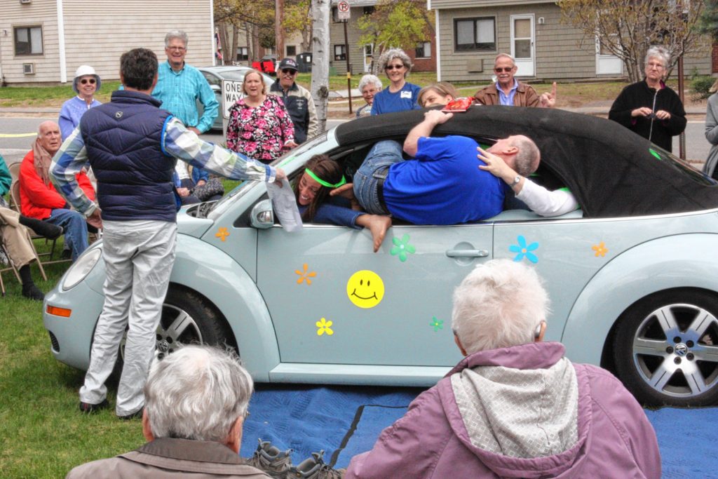 Staffers at Havenwood Heritage Heights teamed up last week to see who could fit more adults into a Volkswagen Beetle. Havenwood is celebrating its 50th anniversary all year long, and the Stuff a Bug competition was the latest installment of fun activities going on throughout the year. After a lot of contorting, cramming and twisting, both teams -- Stuffed Bugs (green) and Herbie's Love Children (blue) -- managed to stuff 16 adults into a staffer's 2004 convertible Beetle. After an odd tie-breaker, which ended up being based on the age of the first person into the car for the second team, the Stuffed Bugs were determined the winners. Though when you pack 16 adults into a little bug, everybody is a winner -- especially those in the audience. JON BODELL / Insider staff