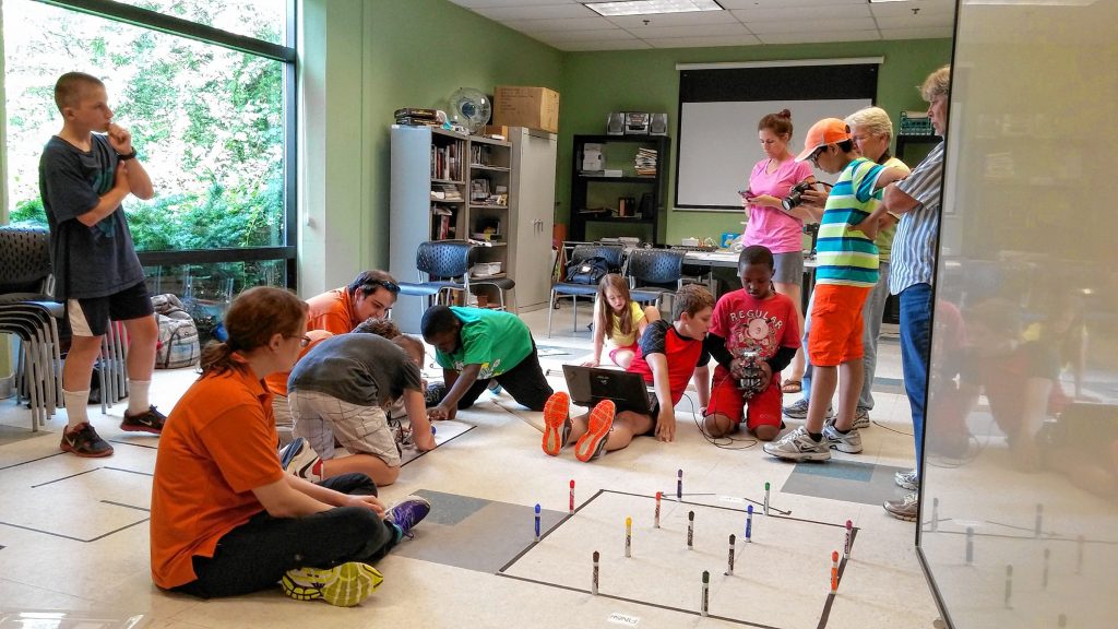 Young science fans take part in Coding Camp at the McAuliffe-Shepard Discovery Center. The Discovery Center has an astronomical amount of summer camp options to choose from. Courtesy of Jeanne Gerulskis