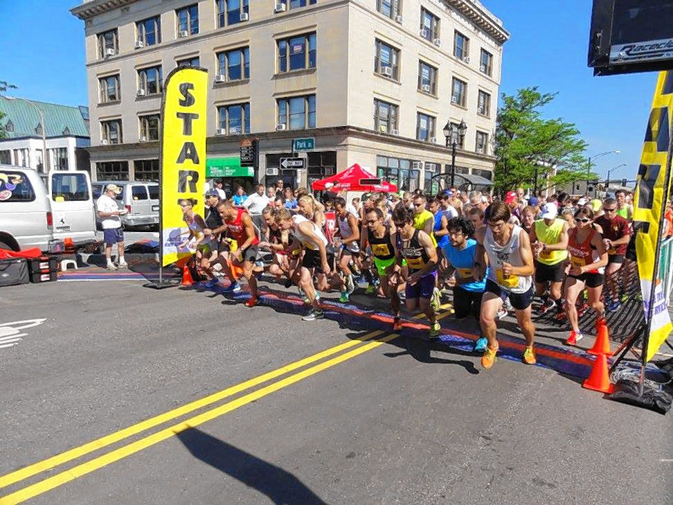 Runners sprint out of the gate at last year's inaugural Capital City Classic 10K. This year's race will be held on Saturday, the final day of Market Days. Courtesy of GRANITE STATE RACE SERVICES