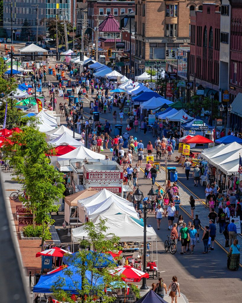 People walk along N. Main Street during opening day of Intown Concord’s Market Days Festival, Thursday, June 23, 2016. (ELIZABETH FRANTZ / Monitor staff) 