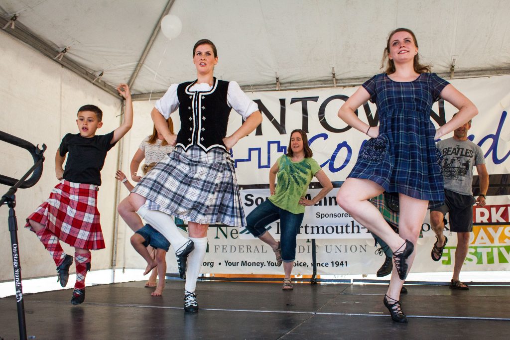 Audience members including Cathy Schlottmann (back row) of Dunbarton learn to dance by watching 8-year-old Nicky Castro (left to right), Courtney Castro, Sveta Gerace, and others from the New Hampshire School of Scottish Arts during Intown Concord’s Market Days Festival, Thursday, June 23, 2016. (ELIZABETH FRANTZ / Monitor staff) ELIZABETH FRANTZ