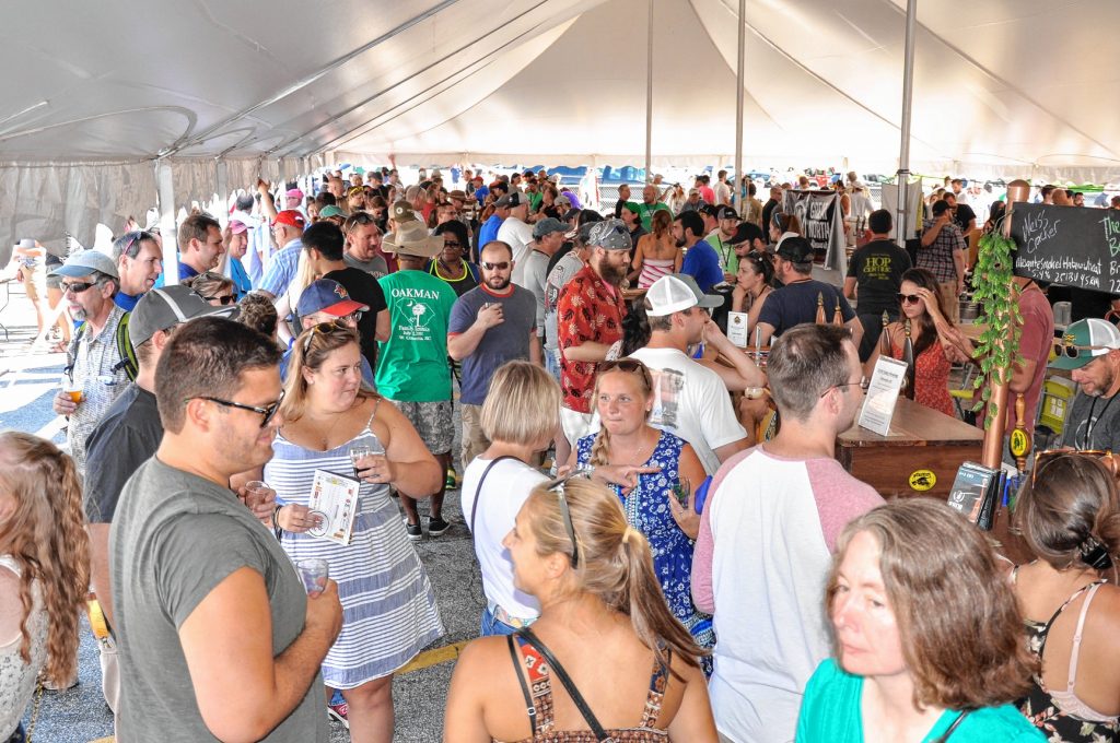 Last year's New Hampshire Brewers Festival, held in Manchester, was packed, and organizers are expecting another big crowd at this year's event at Kiwanis Waterfront Park in Concord on July 22. The festival will feature more than 40 breweries, all from the Granite State. Courtesy of Scott Kaplan and Deb Corradino