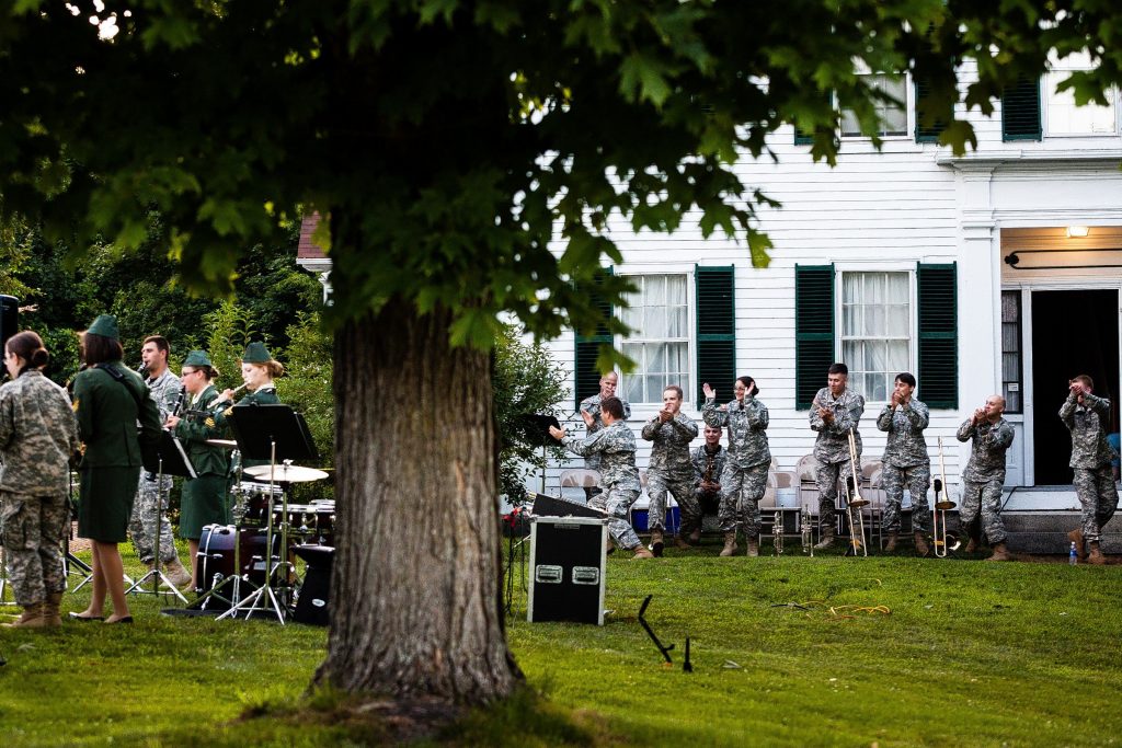 Members of the New Hampshire Army National Guard 39th Army Band clap along to a song during their performance on the lawn of the Pierce Manse in Concord on July 24, 2014. The Pierce Manse was celebrating its 40 years of being open to the public.  (WILL PARSON/Monitor staff) Will Parson