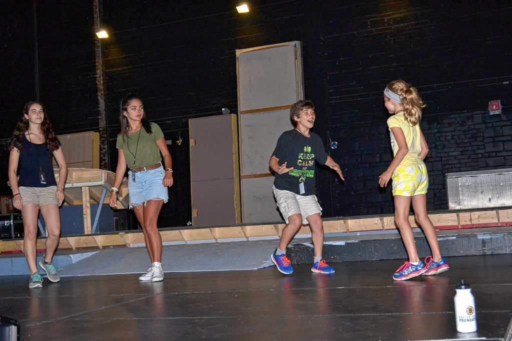 Lizzie Sacco (Sarafina), Emily Baylus (Sarabi), Nathan Baylus (Young Simba), and Emma Hotten-Somers (Young Nala) go through rehearsal last week for the 'The Lion King, Jr.' put on by RB Productions. TIM GOODWIN / Insider staff