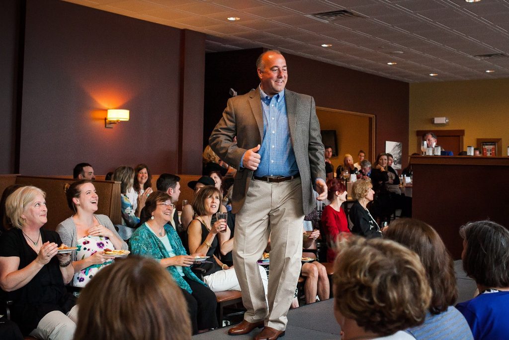 Concord Mayor Jim Bouley walks the runway in JoS. A. Bank during Couture for a Cause, a fashion show and silent auction to benefit Womenade of Concord, at O Steaks & Seafood's Capital Club in Concord on Thursday, May 14, 2015.  (ELIZABETH FRANTZ / Monitor staff) ELIZABETH FRANTZ