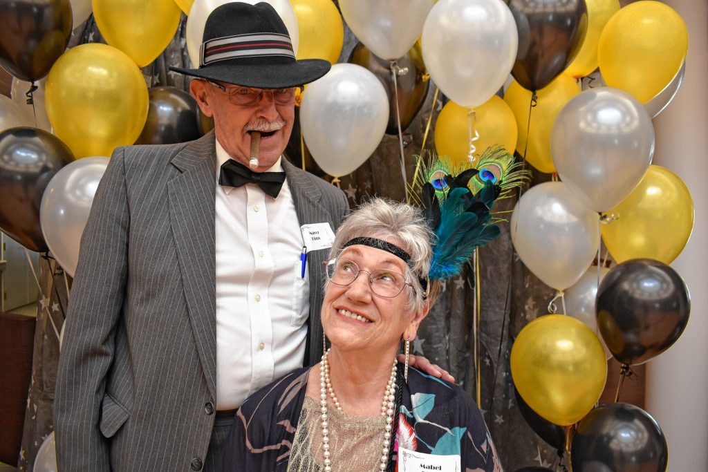 Havenwood Heritage Heights residents Ken Henderson and Joan Korsch -- aka Mayor Biggs and Mabel Biggs -- donned 1920s costumes for the evening of murderous fun. And just for the record, nobody was actually murdered during the event (we hope). Courtesy of Jane Poitras / Havenwood Heritage Heights