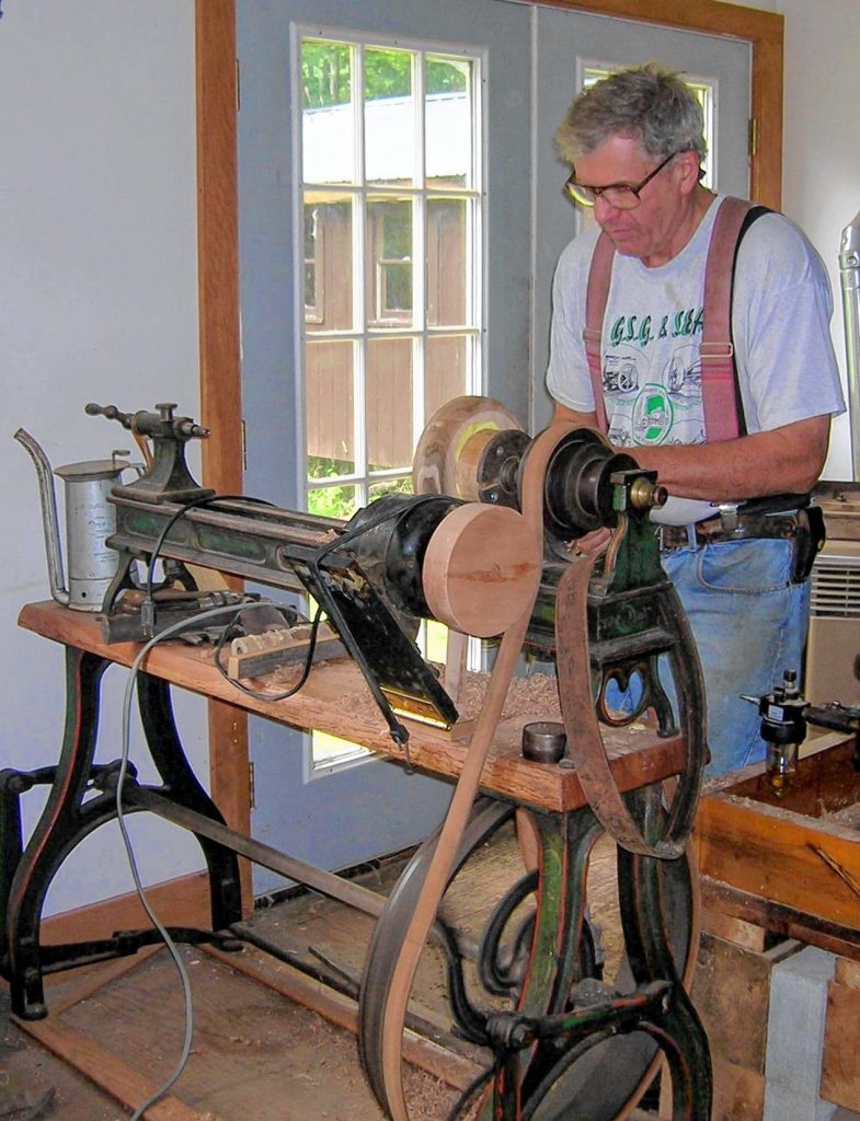 Dave Emerson of Old Ways Traditions working at one of his lathes. Courtesy