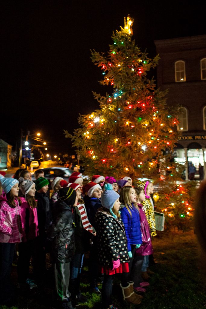 The Penacook Elementary School Chorus sings Christmas carols during the annual Christmas tree lighting ceremony at the Village Square in Penacook on Wednesday, Nov. 30, 2016. (ELIZABETH FRANTZ / Monitor staff) ELIZABETH FRANTZ
