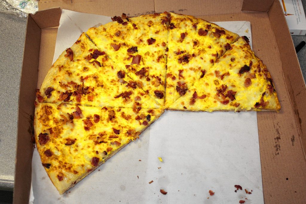 This breakfast pizza from Cimo's South End Deli sure didn't last long around the newsroom. JON BODELL / Insider staff