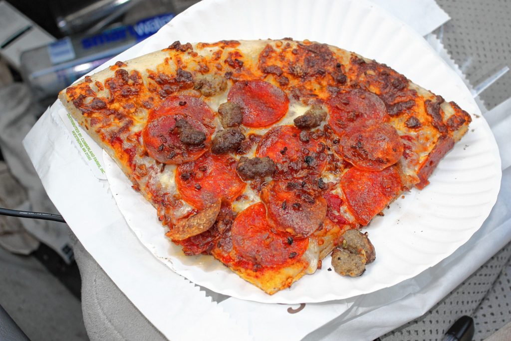 This Super Slice -- twice the size of a regular slice -- from Cumberland Farms on North Main Street came with pepperoni, bacon and sausage, and was served very hot. JON BODELL / Insider staff