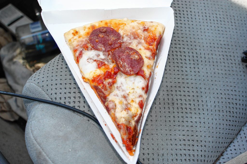 We grabbed a slice of pepperoni from 7-Eleven on Loudon Road, which came in this adorable little pizza-slice-shaped box. JON BODELL / Insider staff
